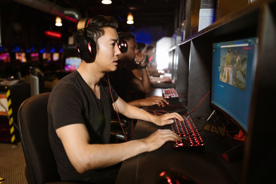 young men gaming at an internet cafe