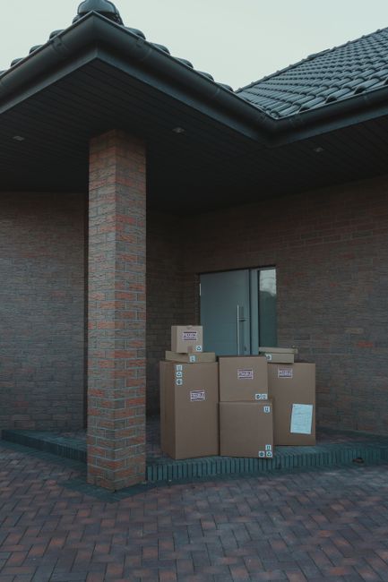 Delivery boxes left outside a residential door in Korea