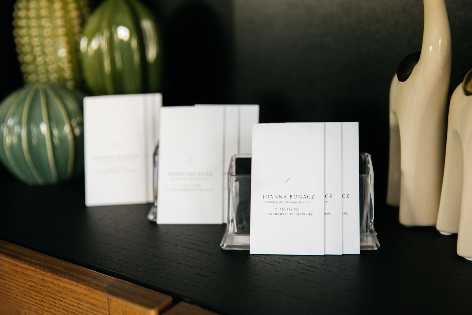 Korean business cards on a desk, showing how names and titles are formally presented
