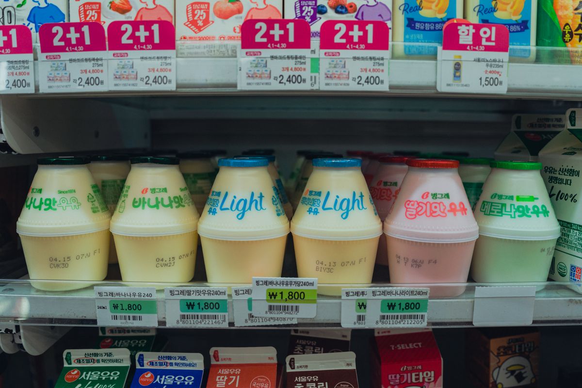 Refrigerated shelf of drinks including non-alcoholic beer at a Korean convenience store