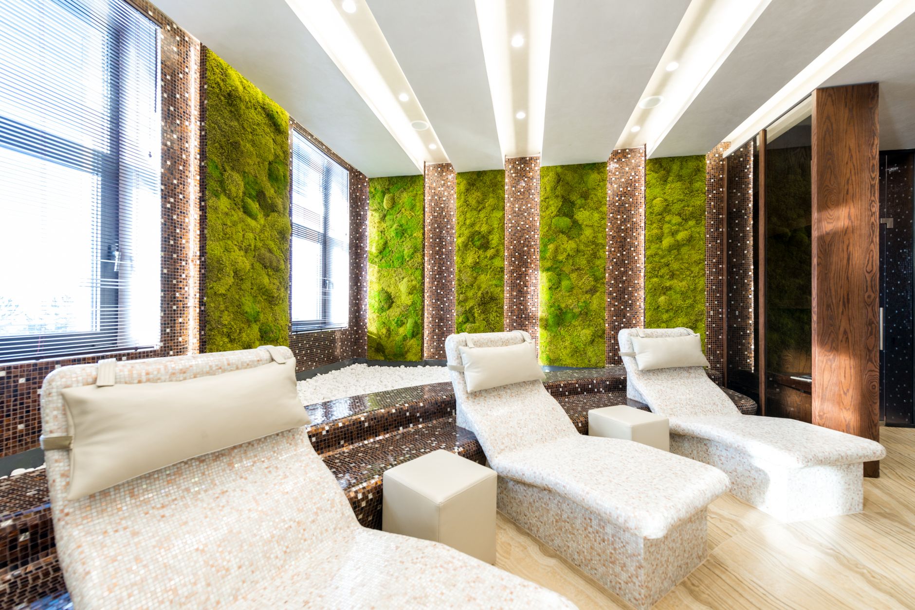 Contemporary wellness center lounge with tiled loungers