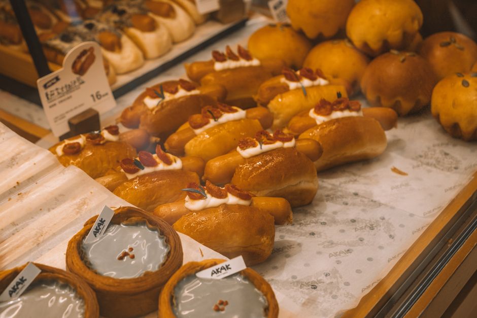 Fresh bread and pastries displayed at a Korean bakery