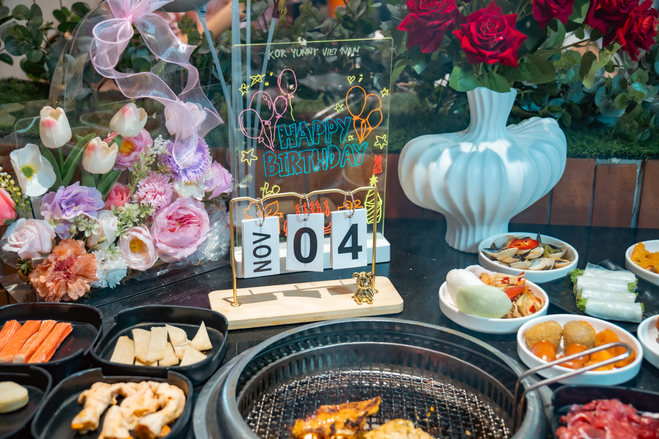 Korean family celebrating a birthday together at home