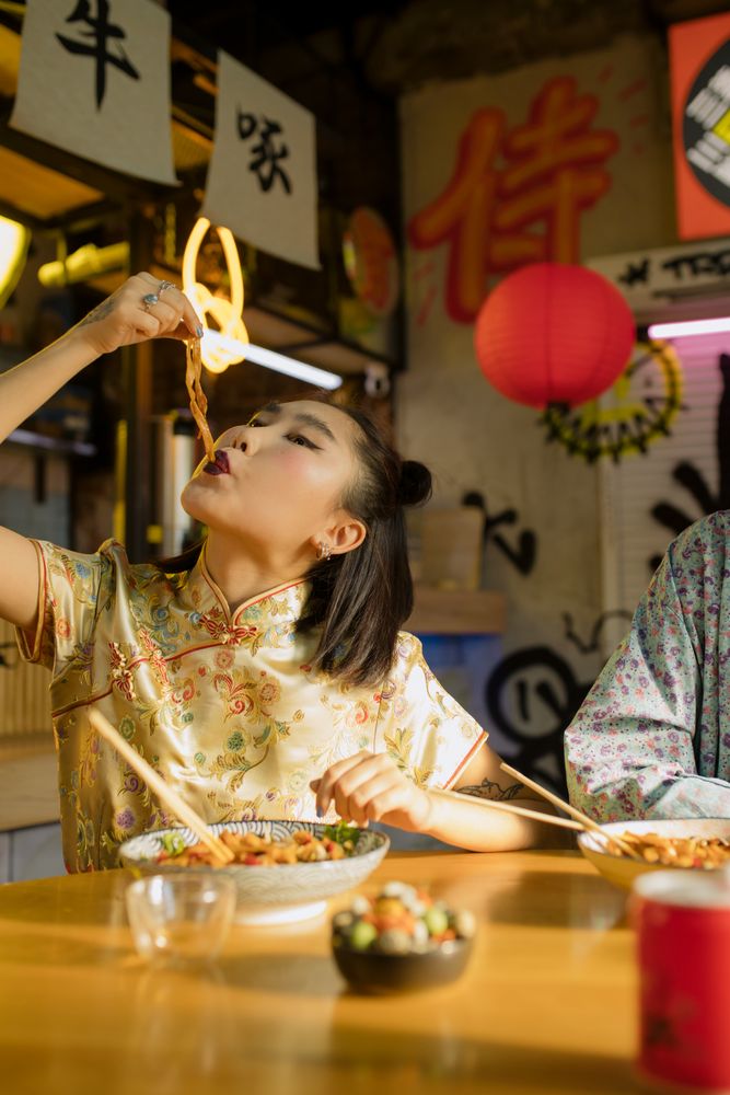 A person eating noodles, the everyday scene mukbang broadcasts are built around