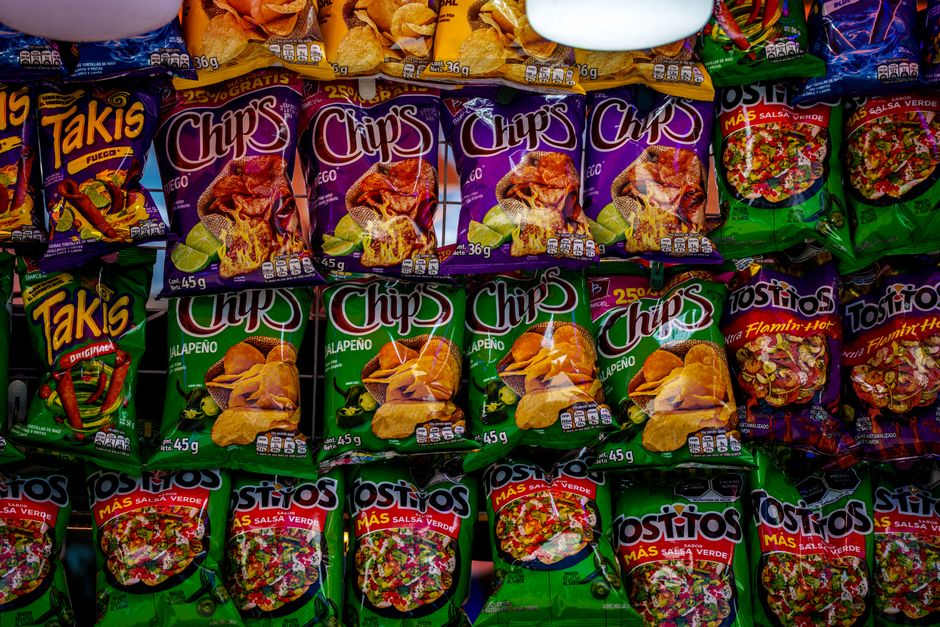 Bag of Korean snacks and chips on a convenience store shelf